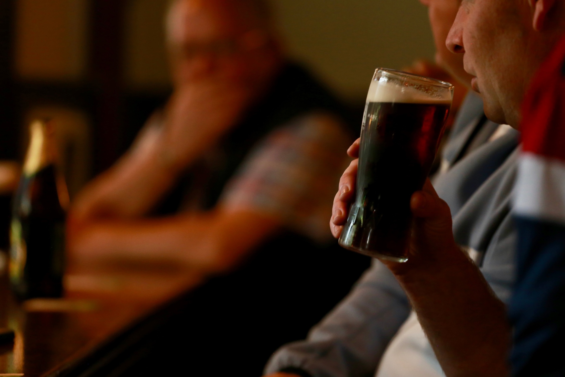 Regulars sharing a pint at the bar